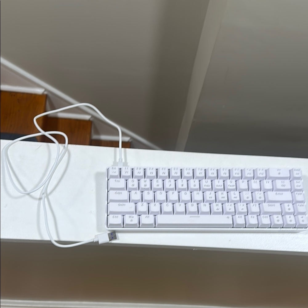 White Modern Office Setup with Sleek Keyboard